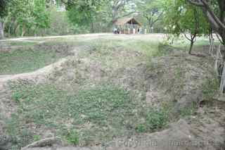 Choeung Ek Genocidal Center, killing fields excavated pit, Cambodia
