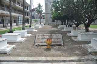 Tuol Sleng Genocide Museum courtyard tombs